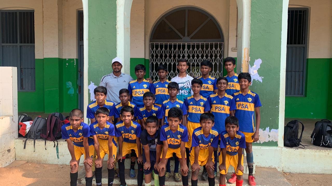PSA students with coaches after training